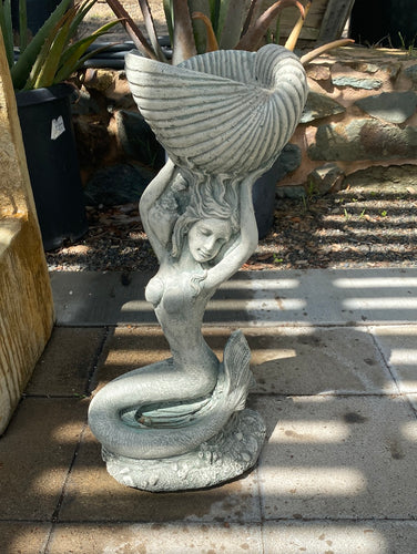 Lifting Mermaid Statue